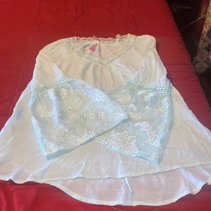 Don’t wear it anymore. It’s just a shirt